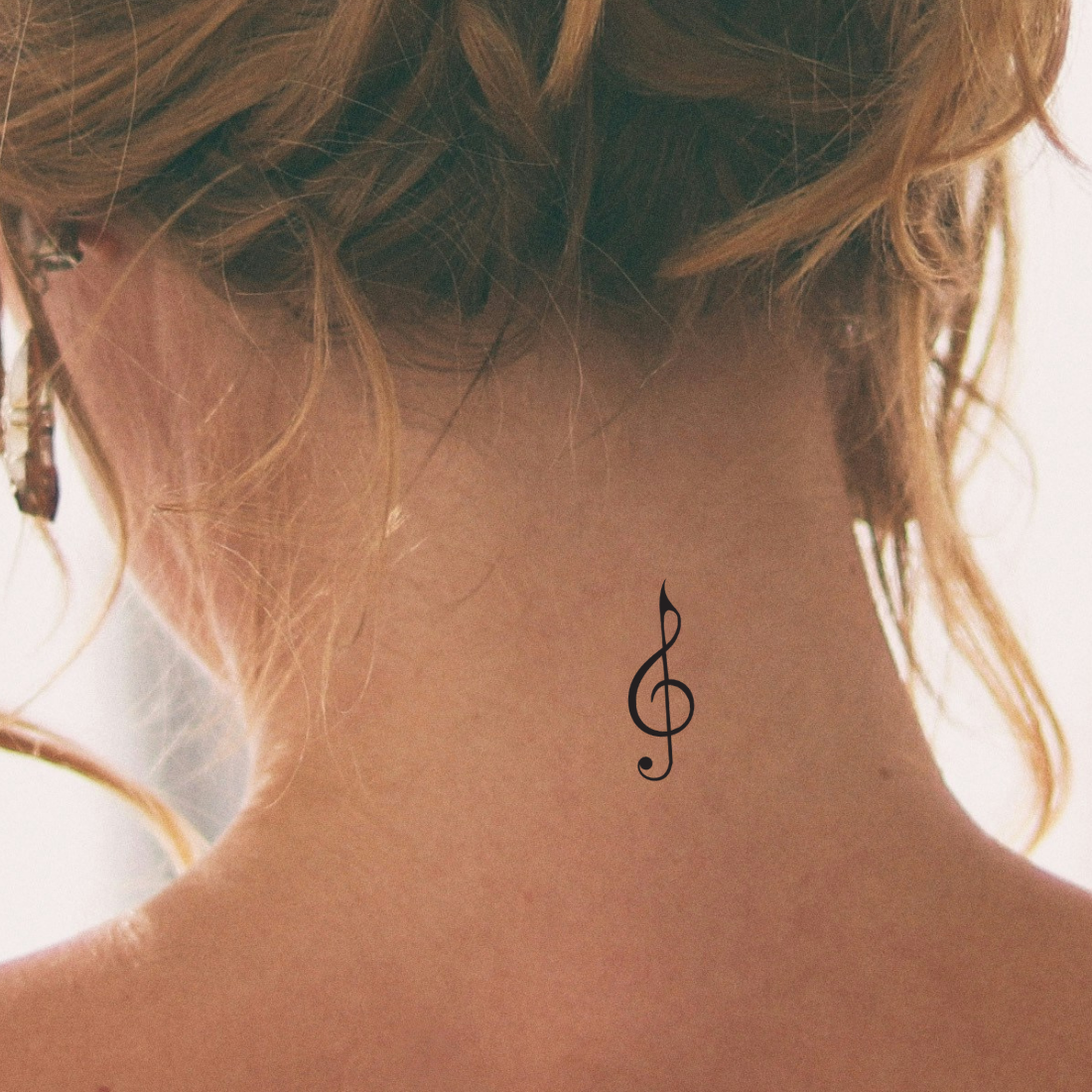 Notenschlüssel Tattoo